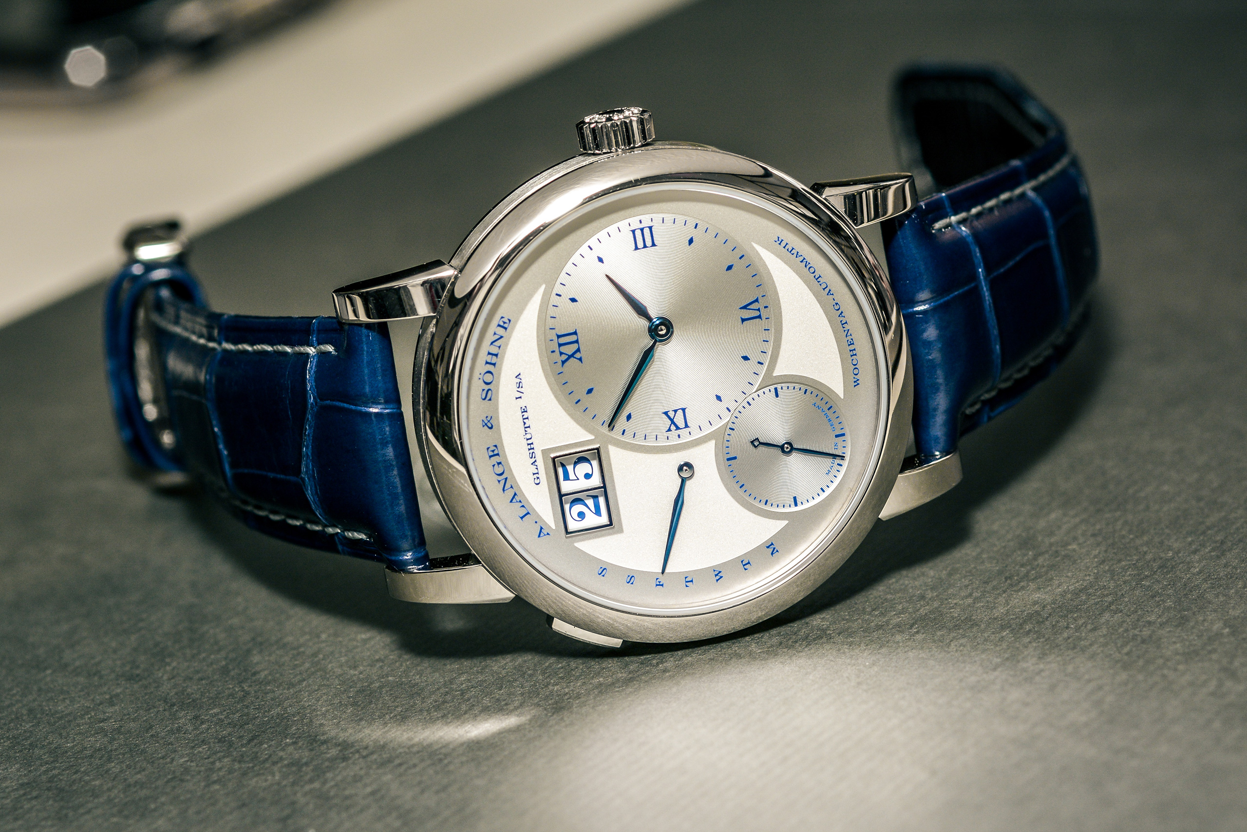 The 18k white gold copy watch has silvery dial.